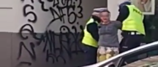 В Польщі закували в кайданки жінку без маски [+ВІДЕО]