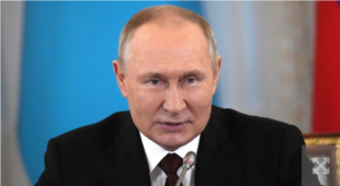 Putin says Russia has no plan to attack Poland